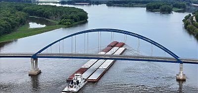 Mississippi river boat pushing cargo